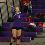 Maekaila Divinagracia puts the ball in play for Oak Harbor.(Photo by John Fisken)