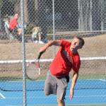 Drake Borden fires a serve in his win in second singles. (Photo by Jim Waller/Whidbey News-Times)