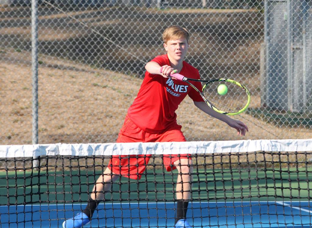 Mason Grove volleys with a backhand. (Photo by Jim Waller/Whidbey News-Times)