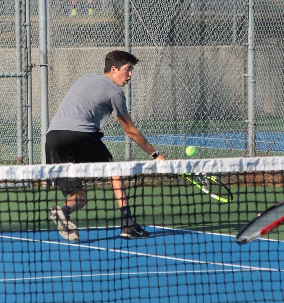 James Wood hustles to run down a shot.(Photo by Jim Waller/Whidbey News-Times)