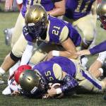 Ethan Pace (55) pounces on a Marsville-Pilchuck fumble as Calvin Whelpley (21) closes in.(Photo by John Fisken)