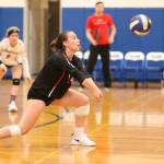 Ashley Menges digs the ball for Coupeville Saturday.(Photo by John Fisken)