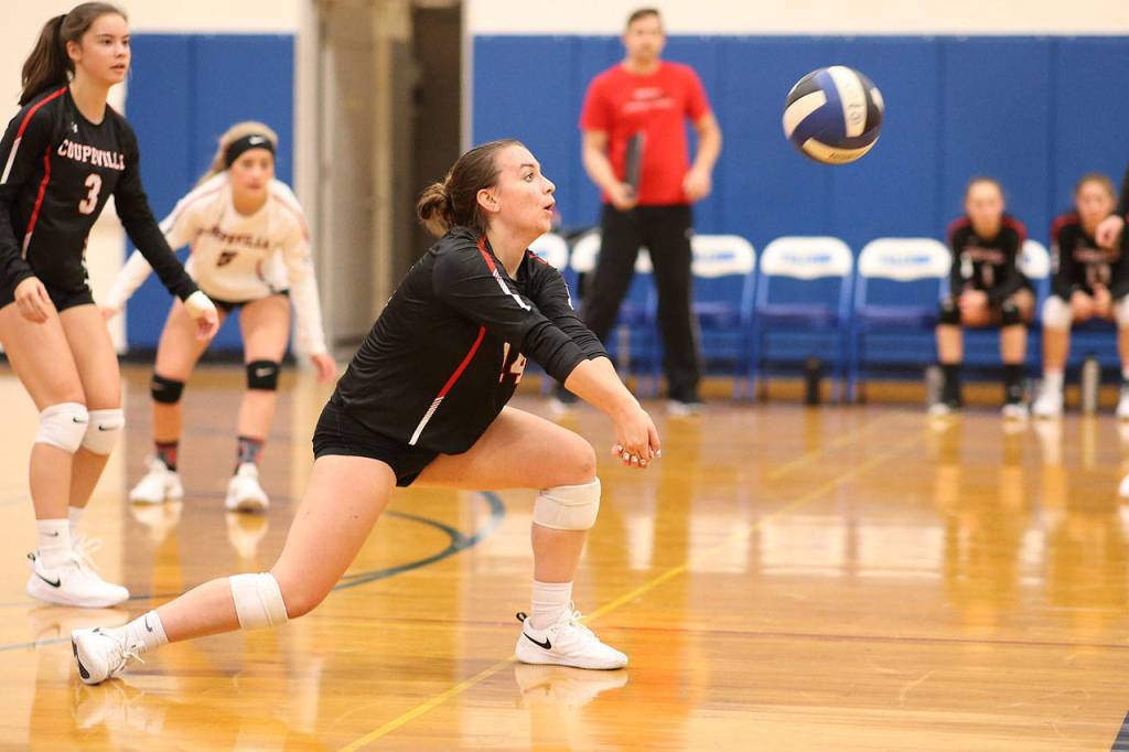Ashley Menges digs the ball for Coupeville Saturday.(Photo by John Fisken)