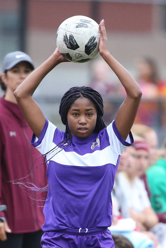 Jessica Vester puts the ball in play during the Cascade match.(Photo by John Fisken)