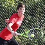 James Wood flips a backhand in his second doubles match.(Photo by John Fisken)