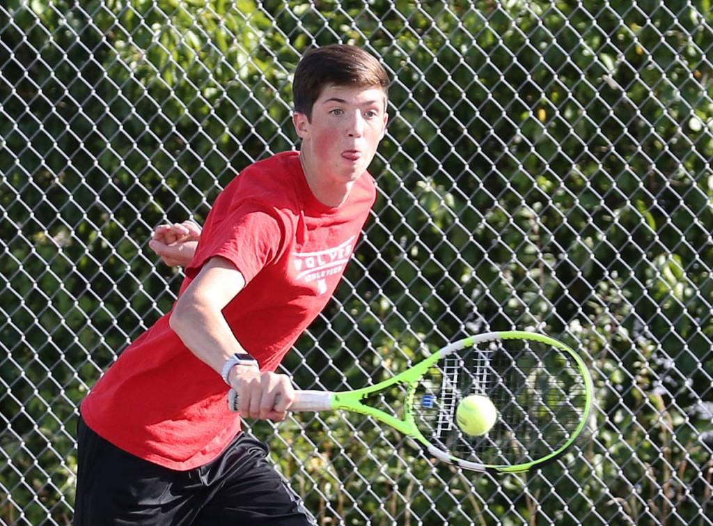 James Wood flips a backhand in his second doubles match.(Photo by John Fisken)