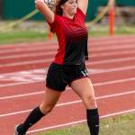Ema Smith tosses the ball in play Thursday.(Photo by John Fisken)