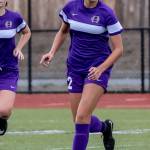 Mikhaela Cortez looks up field for an open teammate. (Photo by John Fisken)