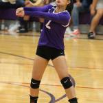 Sophomore Gredina DeGuzman passes for the Wildcats in Tuesdays win. DeGuzman was one of several young players who helped Oak Harbor defeat Lynnwood. (Photo by John Fisken)