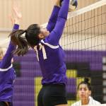 Leah Quidachay stuffs a Lynnwood hit.(Photo by John Fisken)
