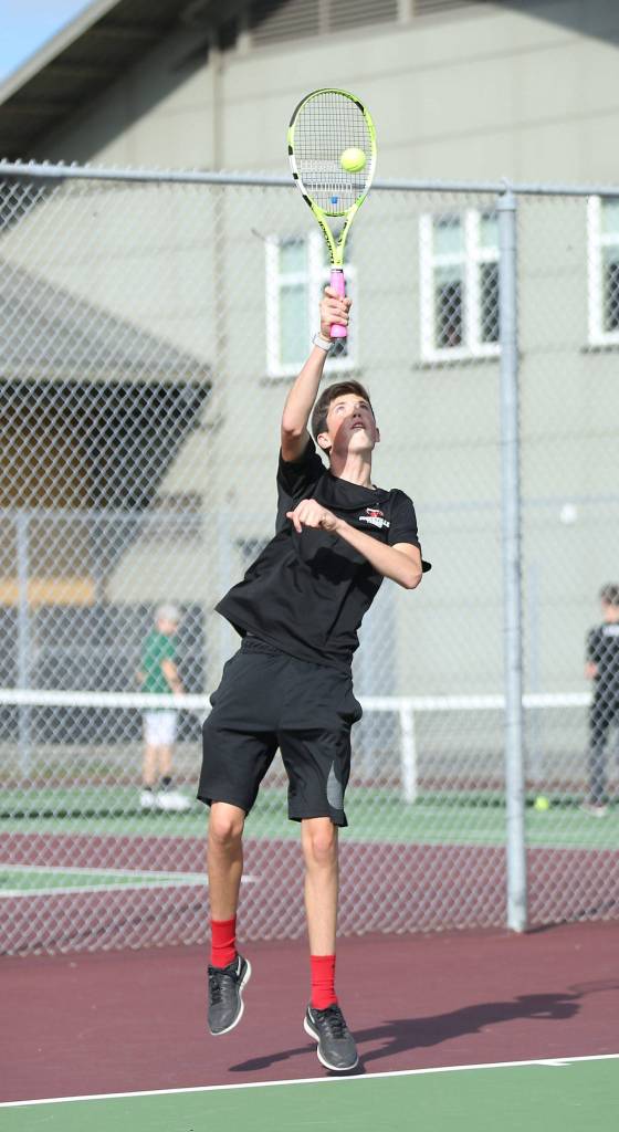 James Wood serves for the Wolves Wednesday.(Photo by John Fisken)