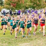 The three girls teams start the 5,000-meter run.(Photo by John Fisken)