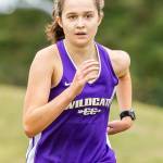 Alex Smith places third among the girls and first for Oak Harbor.(Photo by John Fisken)
