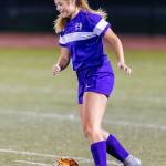 Natalie Plush pushes the ball up field for Oak Harbor.(Photo by John Fisken)