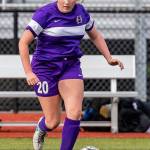 Morgan Lamar advances the ball for Oak Harbor.(Photo by John Fisken)