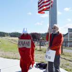 Marran Gray and Robert Gray stand at the corner of State Route 20 and Main Street in Coupeville Monday afternoon in protest of the Brett Kavanaughs nomination to the Supreme Court. Photo by Laura Guido/Whidbey News-Times