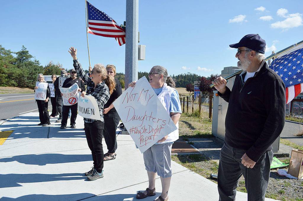 The group Indivisible Whidbey participated in a national walkout in protest of Brett Kavanaughs nomination to supreme court and in support of women who accused him of sexual misconduct. Photo by Laura Guido/Whidbey News-Times
