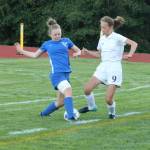 Coupevilles Mary Milnes (9) battles Mallory Drye for possession.(Photo by Jim Waller/Whidbey News-Times)