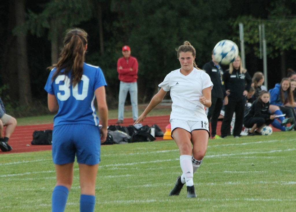 Lindsey Roberts watches her free kick head toward the goal.(Photo by Jim Waller/Whidbey News-Times)