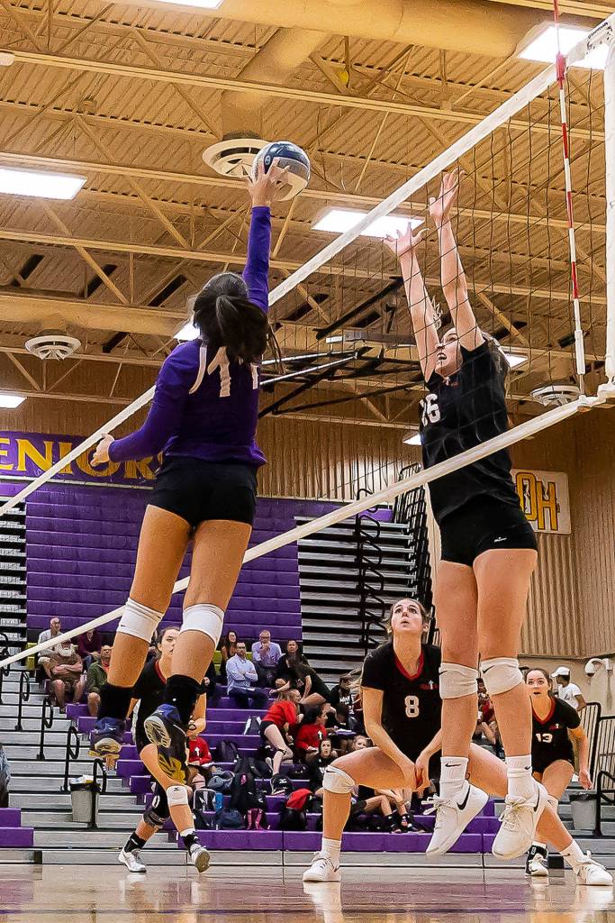 Leah Quidachay tips by the block of a Murphy defender.(Photo by John Fisken)