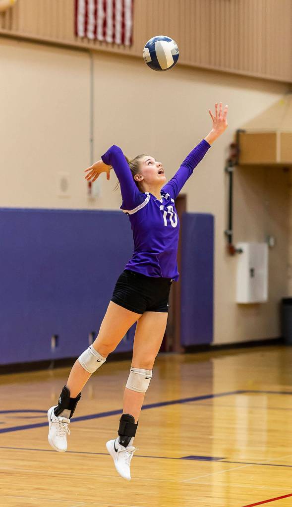 Morgan Pease fires a serve in Oak Harbors 3-0 win over Archbishop Murphy. (Photo by John Fisken)
