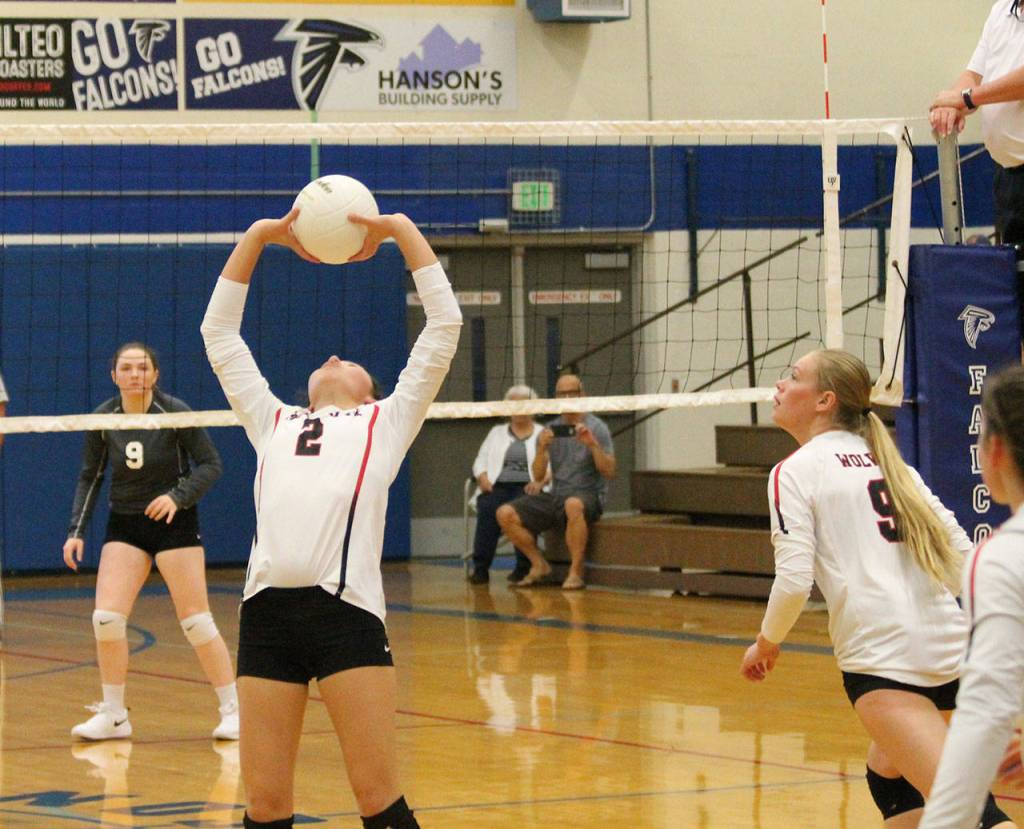 Scout Smith (2) back-sets to Chelsea Prescott.(Photo by Jim Waller/Whidbey News-Times)