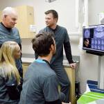 The Wirths discuss a recent case. Photo by Laura Guido/ Whidbey News-Times