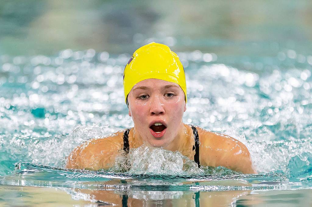 Sophie Sandahl swims for Oak Harbor Tuesday.(Photo by John Fisken)