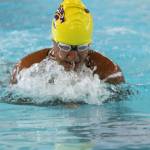 Diandra Dominguez swims to first place in the 100-meter breaststroke. (Photo by Jim Waller/Whidbey News-Times)