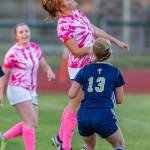 Ema Smith advances the ball with a header.(Photo by John Fisken)