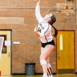 Ashley Menges fires a serve against CPC.(Photo by John Fisken)