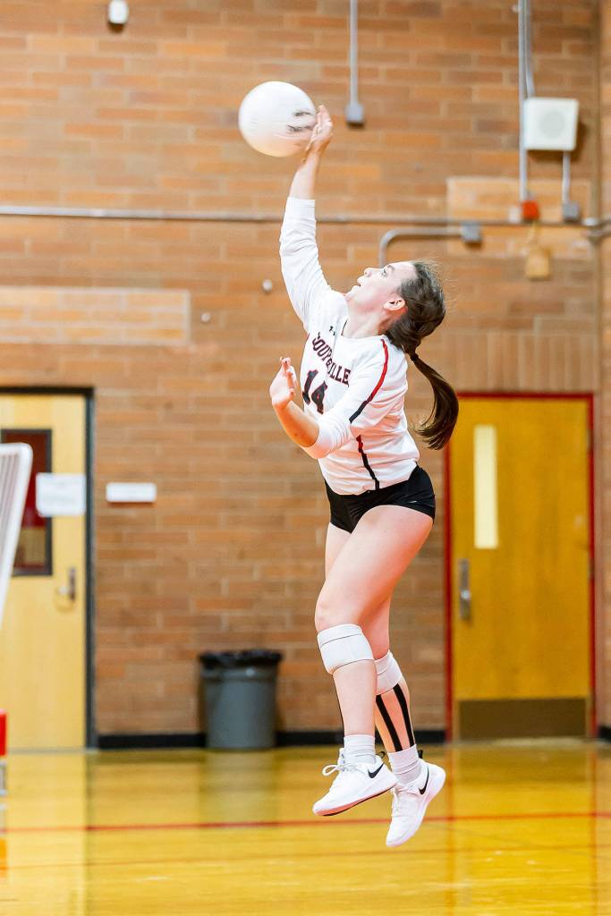 Ashley Menges fires a serve against CPC.(Photo by John Fisken)