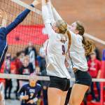 Chelsea Prescott, left, and Emma Smith block an Eagle hit.(Photo by John Fisken)