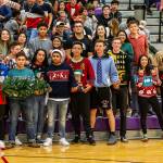A big, supportive student section attired in the weeks Christmas theme back the Wildcats. (John Fisken photo)