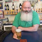 Terry Boese, owner of Wicked Teuton Brewing Company, says he wishes his beard was longer so he could dress up as a wizard for a Harry Potter trivia night happening later this month. The brewer and the library are teaming up to offer two Booktoberfest trivia events, starting Thursday. Photo by Laura Guido/Whidbey News-Times