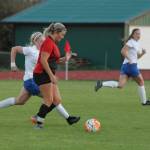 Genna Wright pushes the ball up the field for the Wolves.(Photo by Jim Waller/Whidbey News-Times)