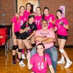 Each year before the Wolves Dig for the Cure match, the players pink-up John Fisken. (Photo by Diane Fisken)
