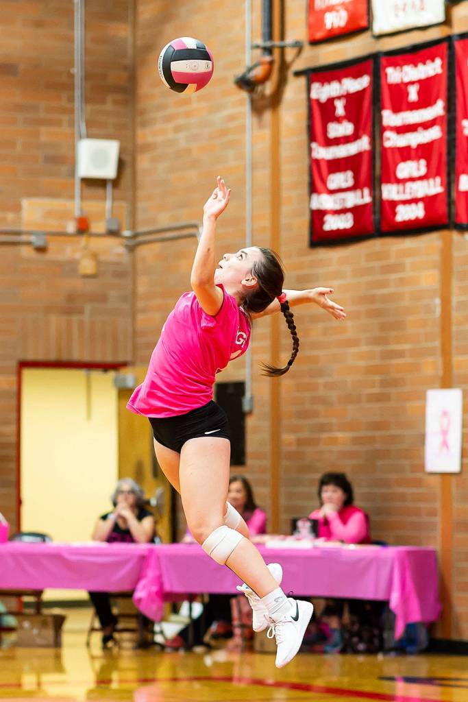 Ashley Menges goes airborne to fire a jump serve.(Photo by John Fisken)