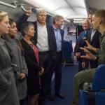 Lt. Luke Duley, assigned to Patrol Squadron 9 conducts a tour of a P-8 Poseidon aircraft for the William B. Ault family at Naval Air Station Whidbey Island. NAS Whidbey Island and Whidbey Association of Naval Aviation hosted a 75th Ault Field naming anniversary, providing a base tour and luncheon for the Ault family in honor of the bases namesake. Photo provided