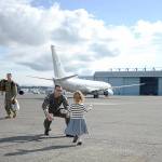 Lt.Cmdr. John Bartis, a pilot assigned to the Skinny Dragons of Patrol Squadron 4, reunites with his daughter following a successful seven-month deployment in the U.S. 7th Fleet area of responsibility.