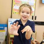 Andrea Gould                                 Elsa. Because shes all blue. Blue and pink and purple are my favorite colors.