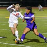 Oak Harbors Tiana Jackson, right, fights Snohomishs Gracie Winders for control. (Photo by John Fisken)