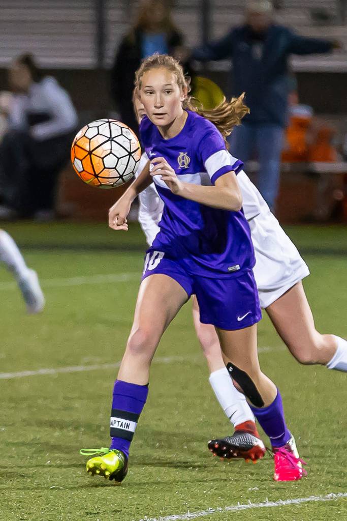 Danielle Lonborg runs down the ball in the Snohomish match.(Photo by John Fisken)