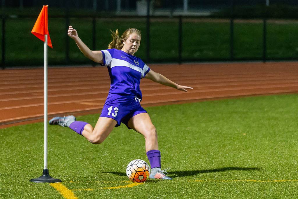 Natalie Plush takes a corner kick for Oak Harbor Tuesday.(Photo by John Fisken)