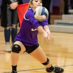Maekaila Divinagracia passes for Oak Harbor in the win over Arlington.(Photo by John Fisken)