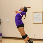Jaslin Webster serves in the Wildcats big win Thursday.(Photo by John Fisken)