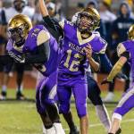 Caleb Fitzgerald throws one of his season high 21 passes Friday. (Photo by John Fisken)