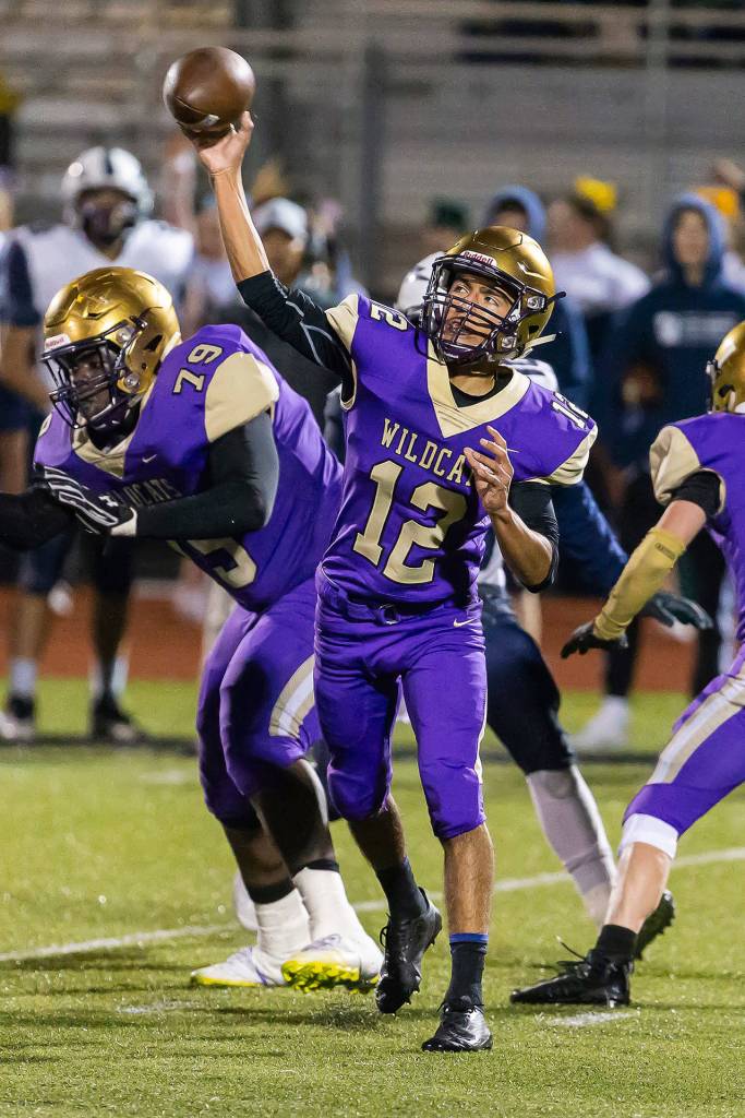 Caleb Fitzgerald throws one of his season high 21 passes Friday. (Photo by John Fisken)
