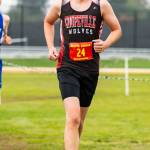 TJ Rickner takes 55th (third for Coupeville) in the league meet.(Photo by John Fisken)