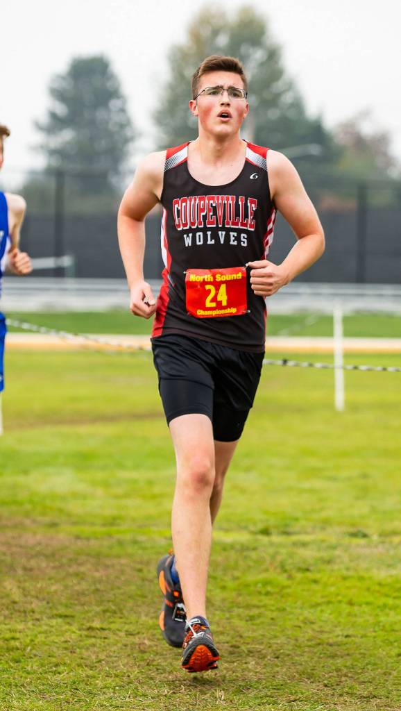 TJ Rickner takes 55th (third for Coupeville) in the league meet.(Photo by John Fisken)